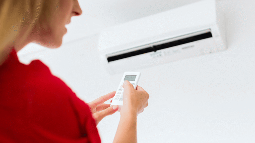 femme devant air climatisé