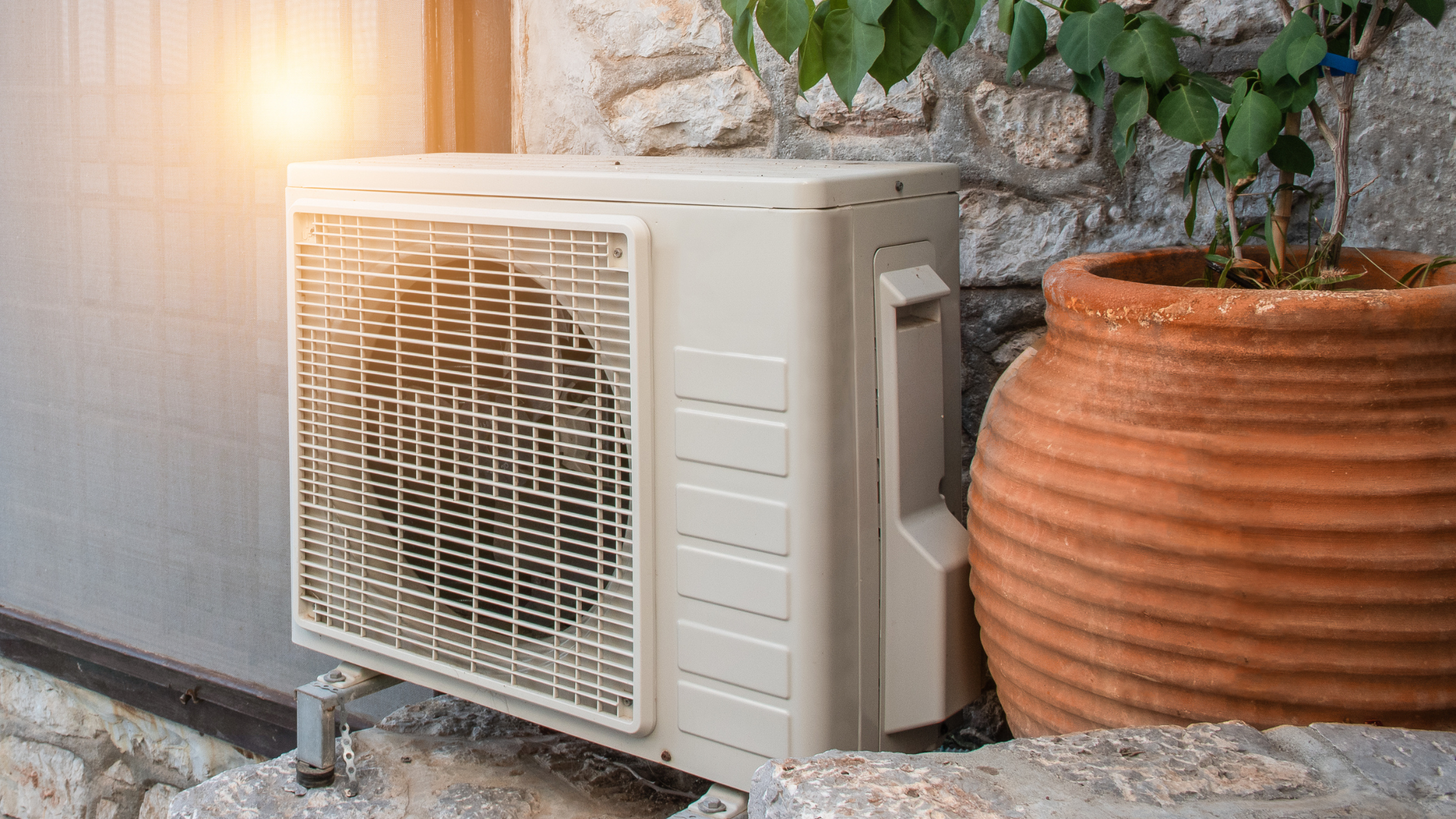 spring heat pump maintenance with rising sun